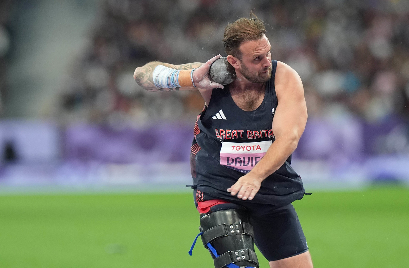 Aled Davies throwing the shot put at the Paralympic Games